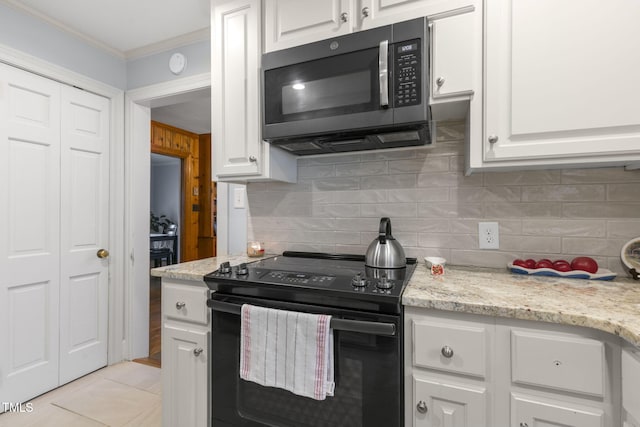 kitchen featuring electric range, crown molding, white cabinets, and decorative backsplash