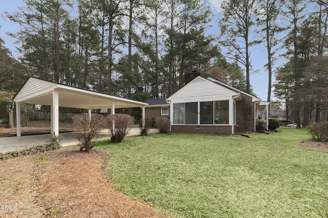 view of yard featuring an attached carport