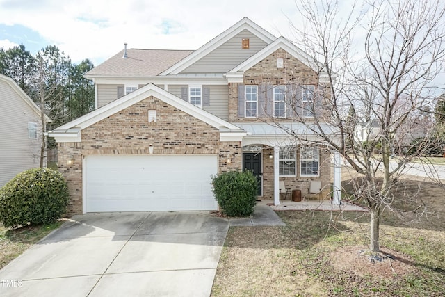 view of front facade featuring concrete driveway, brick siding, and an attached garage