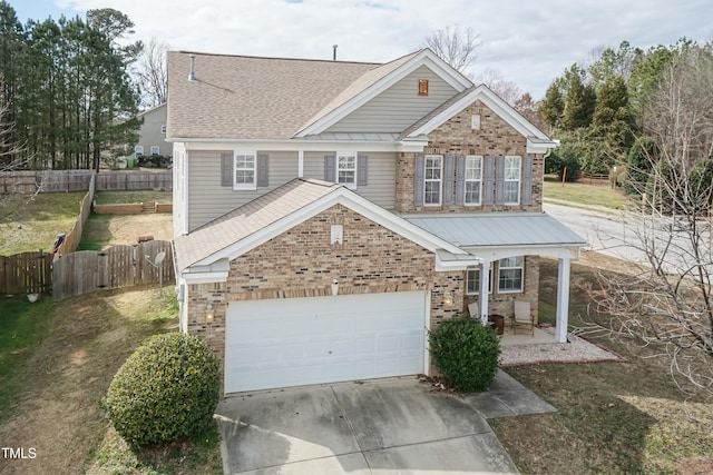 view of front of house with a shingled roof, concrete driveway, covered porch, fence, and brick siding