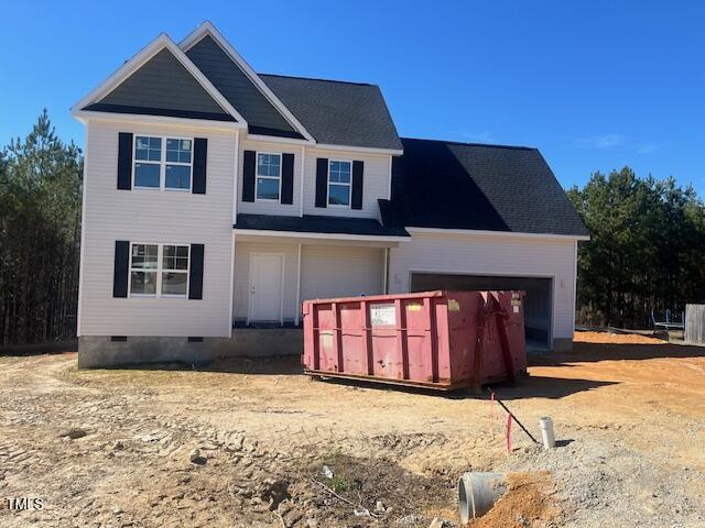 view of front facade featuring crawl space and an attached garage