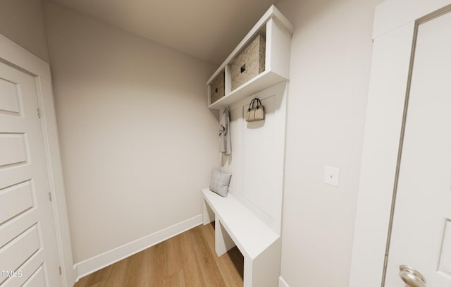 mudroom with light wood-type flooring and baseboards