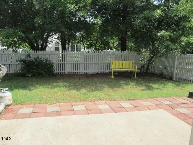 view of yard featuring a patio and fence private yard