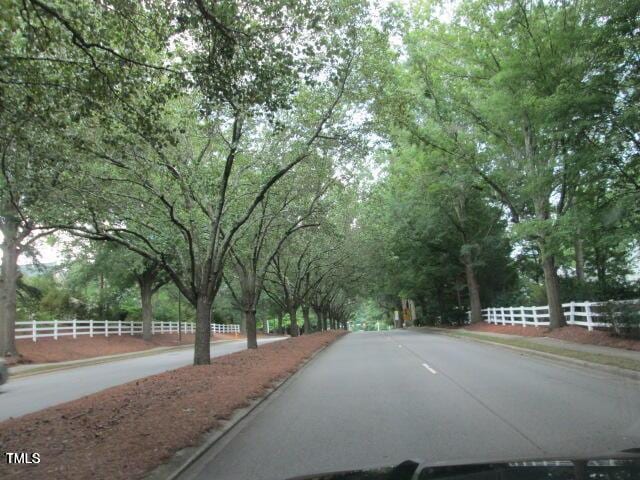 view of road with curbs