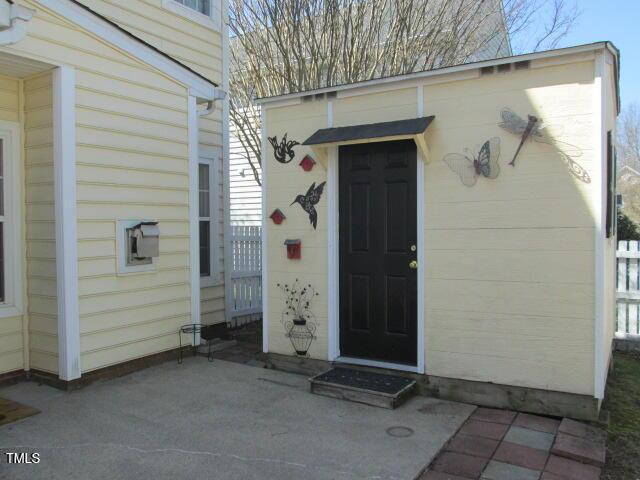 doorway to property featuring a patio area