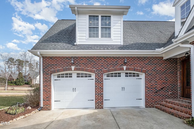 garage with driveway