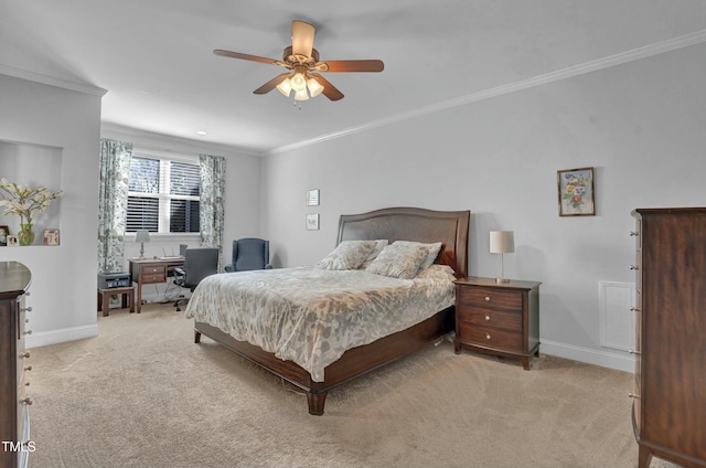 carpeted bedroom featuring ceiling fan, visible vents, baseboards, and ornamental molding