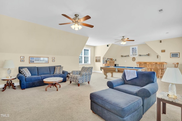 living area featuring carpet, visible vents, baseboards, pool table, and bar