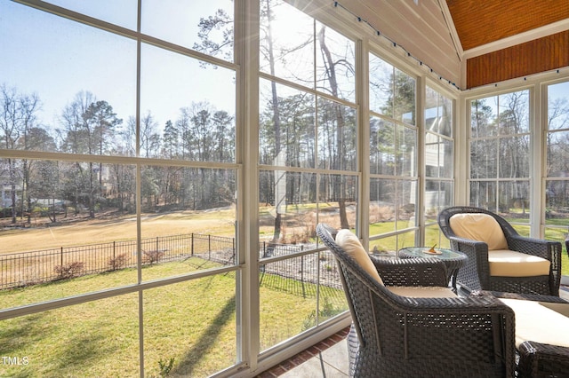 sunroom / solarium featuring a healthy amount of sunlight