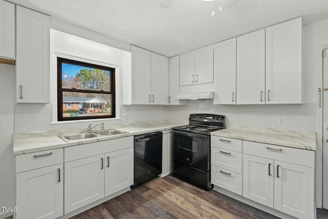 kitchen with black appliances, dark wood-style flooring, a sink, and white cabinetry