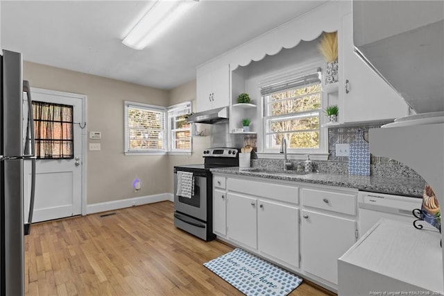 kitchen featuring open shelves, stainless steel appliances, light wood-style flooring, a sink, and under cabinet range hood