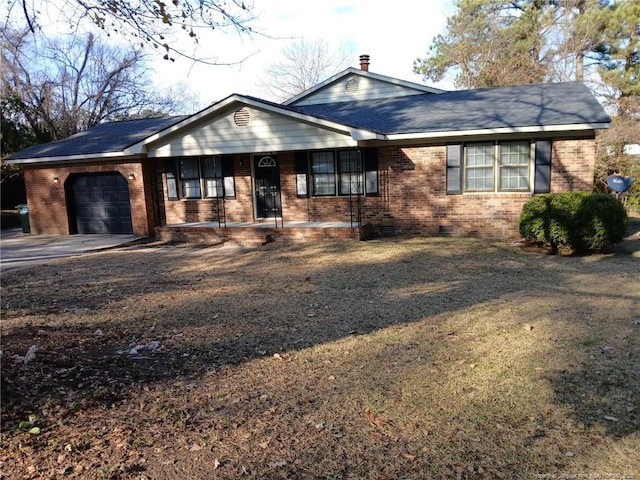 single story home with a garage, crawl space, brick siding, and driveway