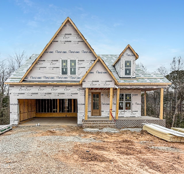 property in mid-construction featuring a garage