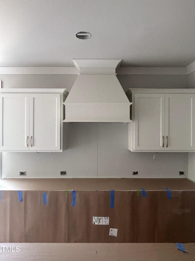 108 Pointe Park Cir, Holly Springs, NC 27540 - kitchen featuring white cabinetry and custom exhaust hood