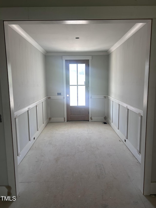 108 Pointe Park Cir, Holly Springs, NC 27540 - empty room featuring ornamental molding, a decorative wall, and wainscoting