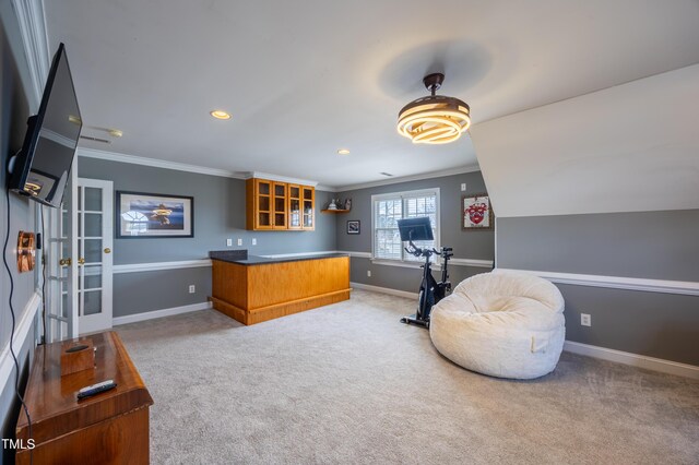 interior space featuring recessed lighting, baseboards, and ornamental molding