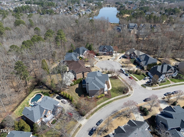 aerial view with a residential view and a water view