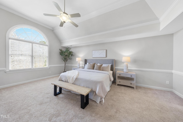 bedroom with lofted ceiling, a ceiling fan, carpet floors, crown molding, and baseboards