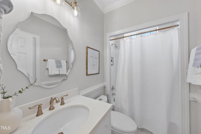 bathroom with vanity, a shower with shower curtain, toilet, and ornamental molding