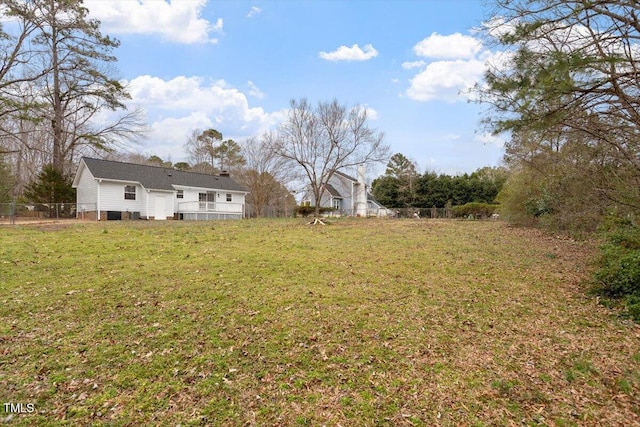 view of yard featuring fence