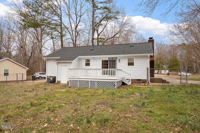 back of property with central AC unit, fence, crawl space, a deck, and a lawn