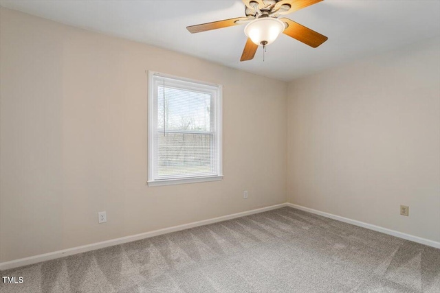 unfurnished room with light carpet, ceiling fan, and baseboards