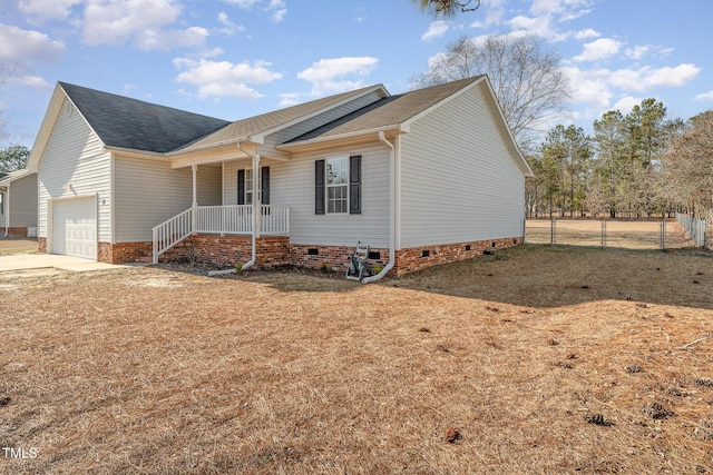 single story home featuring a porch, a garage, fence, driveway, and crawl space