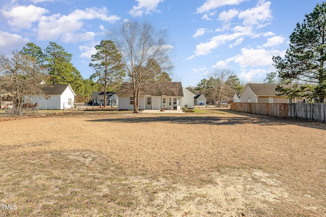 view of yard featuring fence