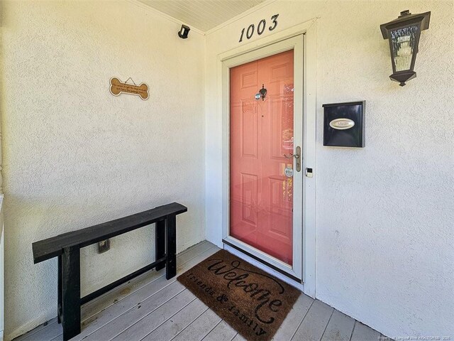 1003 Anarine Rd, Fayetteville, NC 28303 - property entrance with stucco siding