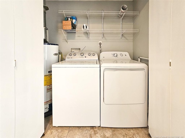 1003 Anarine Rd, Fayetteville, NC 28303 - clothes washing area with water heater and washer and dryer
