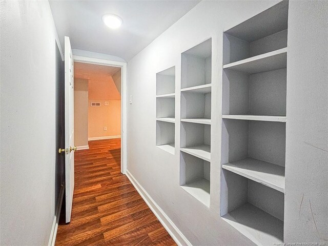 1003 Anarine Rd, Fayetteville, NC 28303 - hallway featuring dark wood-style floors and baseboards