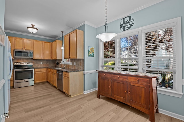 6509 Virgilia Ct, Raleigh, NC 27616 - kitchen featuring baseboards, light wood-style floors, tasteful backsplash, a sink, and stainless steel appliances