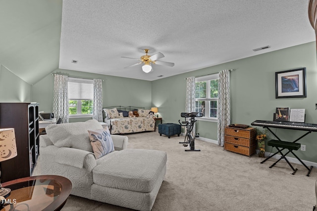6509 Virgilia Ct, Raleigh, NC 27616 - carpeted living area with baseboards, a wealth of natural light, ceiling fan, and visible vents