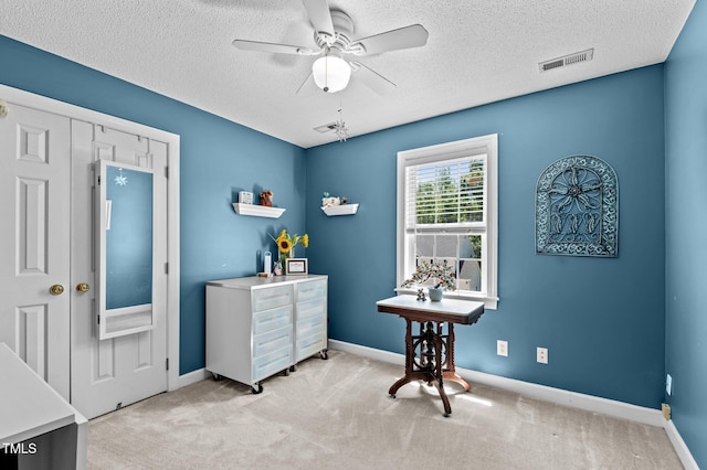 6509 Virgilia Ct, Raleigh, NC 27616 - interior space featuring light carpet, a textured ceiling, a ceiling fan, baseboards, and visible vents