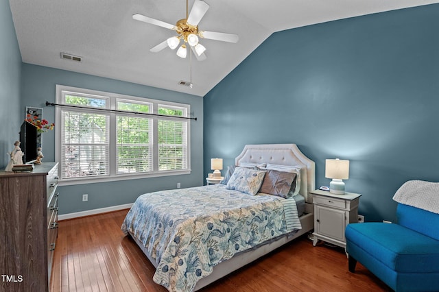 6509 Virgilia Ct, Raleigh, NC 27616 - bedroom featuring ceiling fan, visible vents, wood finished floors, baseboards, and lofted ceiling