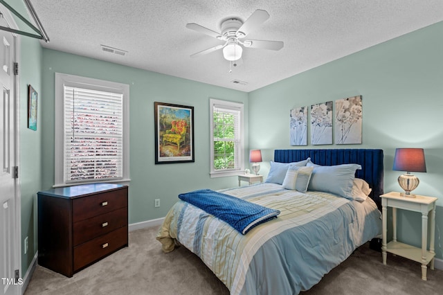 6509 Virgilia Ct, Raleigh, NC 27616 - bedroom featuring visible vents, carpet flooring, and a textured ceiling