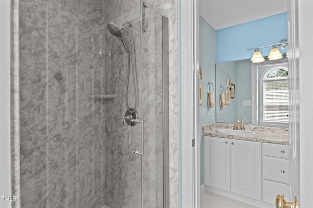 6509 Virgilia Ct, Raleigh, NC 27616 - bathroom with tile patterned floors, a marble finish shower, and vanity
