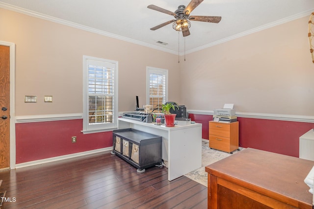 office space with wood-type flooring, visible vents, ceiling fan, and ornamental molding