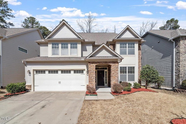 craftsman-style home with a garage, stone siding, driveway, and a shingled roof