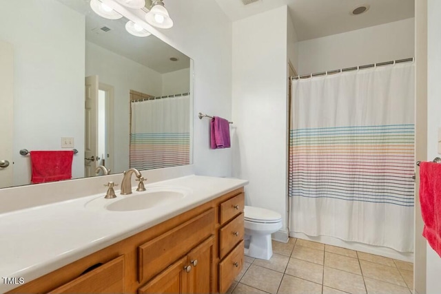 full bath featuring curtained shower, vanity, toilet, and tile patterned floors