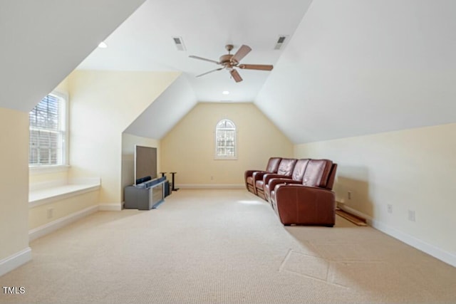 additional living space with carpet, visible vents, vaulted ceiling, and baseboards