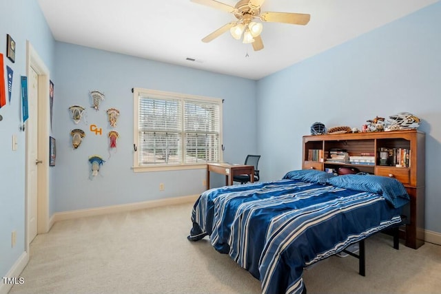 bedroom featuring ceiling fan, carpet flooring, visible vents, and baseboards