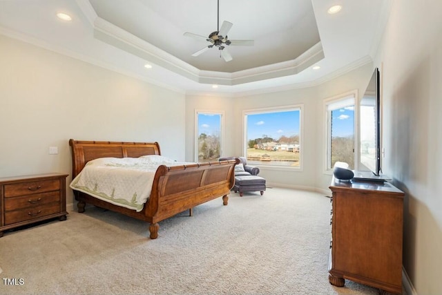 carpeted bedroom featuring recessed lighting, a raised ceiling, crown molding, and baseboards