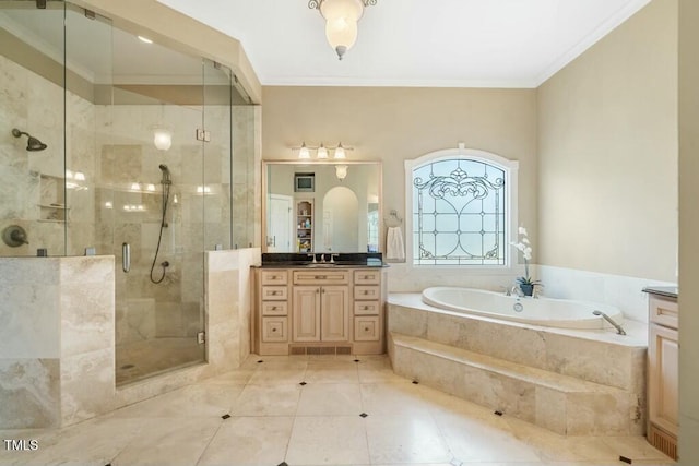 bathroom with tile patterned flooring, vanity, a shower stall, a bath, and crown molding