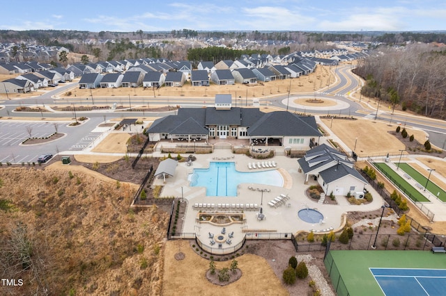 birds eye view of property with a residential view