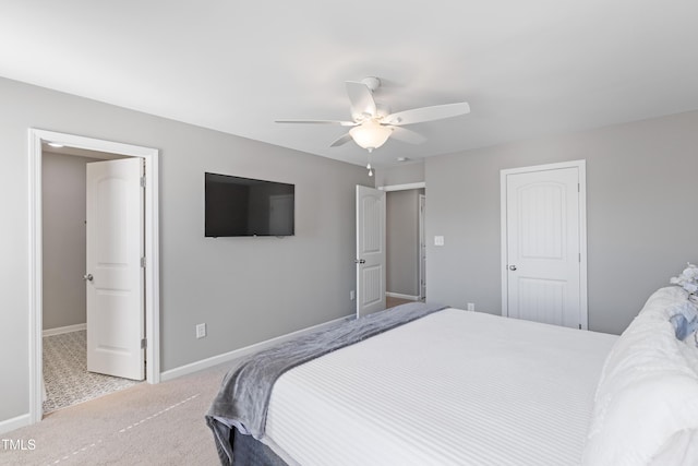 bedroom featuring carpet, baseboards, and ceiling fan