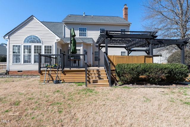 rear view of house featuring a chimney, stairway, crawl space, a pergola, and a wooden deck