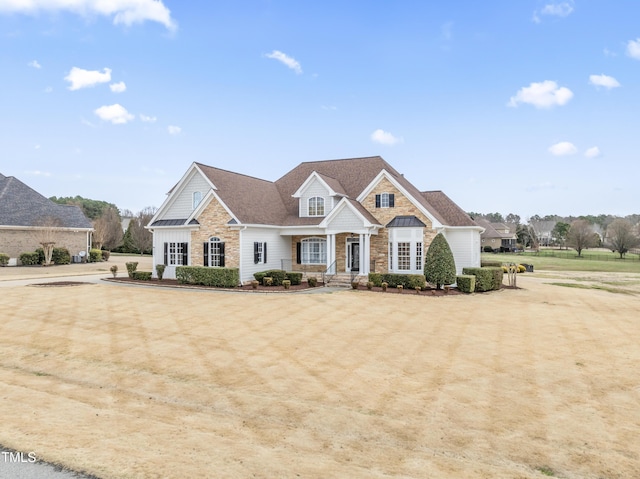 view of front facade featuring stone siding