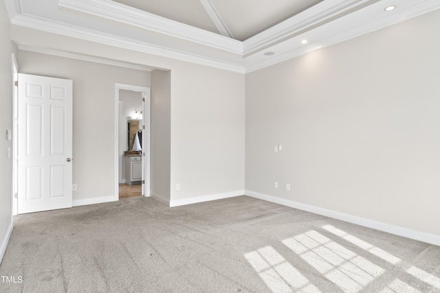 carpeted empty room featuring baseboards, ornamental molding, and recessed lighting