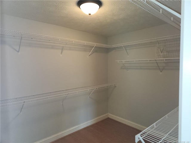 2814 Millbrook Rd, Fayetteville, NC 28303 - walk in closet featuring wood finished floors